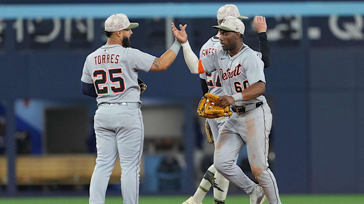 May 18, 2025; Toronto, Ontario, CAN; Detroit Tigers left fielder Akil Baddoo (60) and second baseman Gleyber Torres (25) celebrate the win against the Toronto Blue Jays at the end of the ninth inning at Rogers Centre. May 18, 2025; Toronto, Ontario, CAN; Detroit Tigers left fielder Akil Baddoo (60) and second baseman Gleyber Torres (25) celebrate the win against the Toronto Blue Jays at the end of the ninth inning at Rogers Centre.