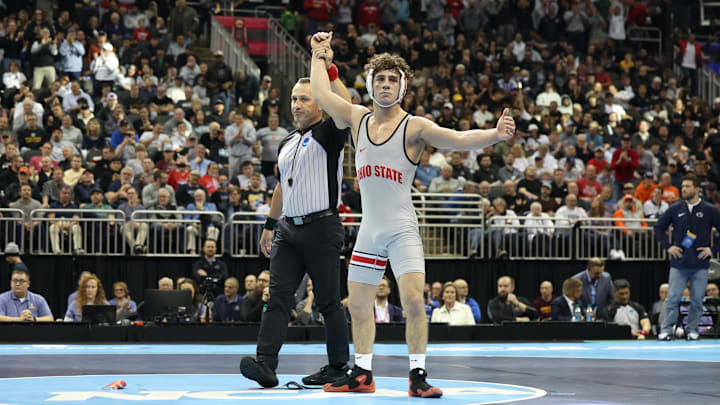 Mar 23, 2024; Kansas City, MO, USA; 141 pounds Ohio State Buckeyes wrestler Jesse Mendez celebrates after beating Penn State Nittany Lions wrestler Beau Bartlett. Mandatory Credit: Reese Strickland-Imagn Images Mar 23, 2024; Kansas City, MO, USA; 141 pounds Ohio State Buckeyes wrestler Jesse Mendez celebrates after beating Penn State Nittany Lions wrestler Beau Bartlett. Mandatory Credit: Reese Strickland-Imagn Images