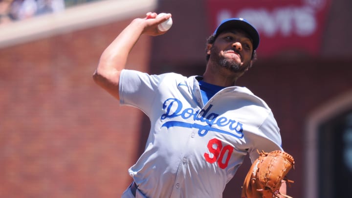 Jun 30, 2024; San Francisco, California, USA; Los Angeles Dodgers relief pitcher Michael Peterson (90) pitches the ball against the San Francisco Giants during the fifth inning at Oracle Park. Mandatory Credit: Kelley L Cox-USA TODAY Sports