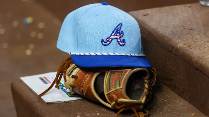 Jul 4, 2025; Atlanta, Georgia, USA; A detailed view of the Atlanta Braves 4th of July hat in the dugout against the Baltimore Orioles in the seventh inning at Truist Park. Mandatory Credit: Brett Davis-Imagn Images
