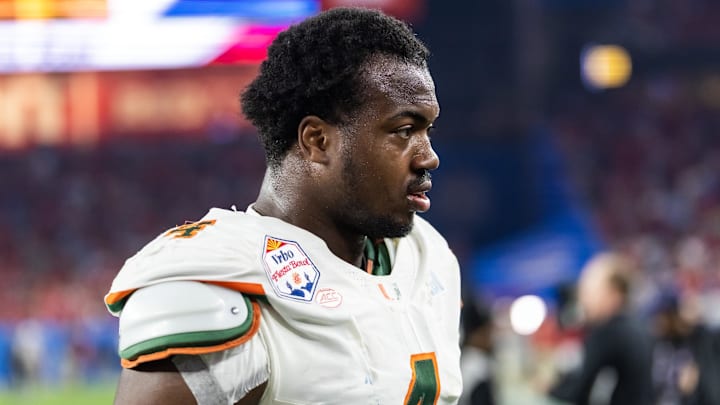 Jan 8, 2026; Glendale, AZ, USA; Miami Hurricanes defensive lineman Rueben Bain Jr. (4) against the Mississippi Rebels during the 2026 Fiesta Bowl and semifinal game of the College Football Playoff at State Farm Stadium. Mandatory Credit: Mark J. Rebilas-Imagn Images