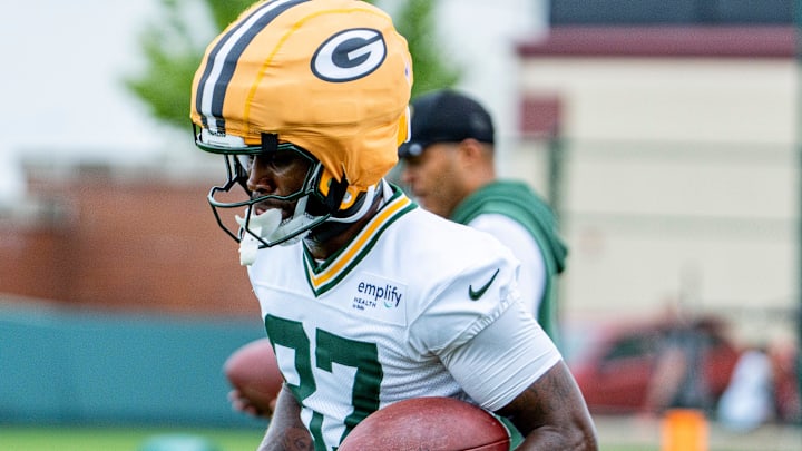 Green Bay Packers wide receiver Romeo Doubs (87) runs the ball during the second day of training camp on July 24. Green Bay Packers wide receiver Romeo Doubs (87) runs the ball during the second day of training camp on July 24.