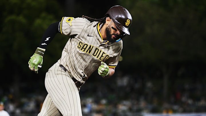 Apr 7, 2025; West Sacramento, California, USA; San Diego Padres outfielder Fernando Tatis Jr. (23) rounds the bases after hitting a home run against the Athletics during the sixth inning at Sutter Health Park. Mandatory Credit: Ed Szczepanski-Imagn Images