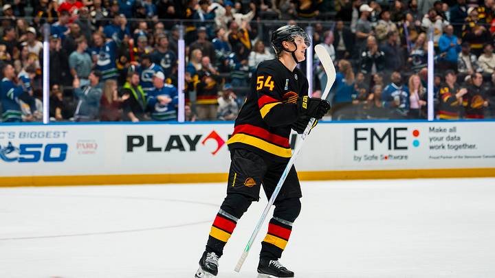 Oct 3, 2026; Vancouver, British Columbia, CAN; Vancouver Canucks forward Aatu Raty (54) celebrates his goal against the Calgary Flames in the third period at Rogers Arena. Mandatory Credit: Bob Frid-Imagn Images