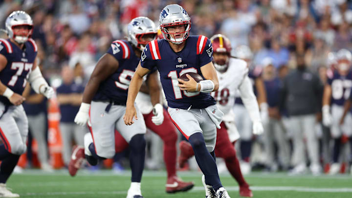 Aug 8, 2025; Foxborough, Massachusetts, USA; New England Patriots quarterback Drake Maye (10) runs the ball during the first half against the Washington Commanders at Gillette Stadium. Mandatory Credit: Paul Rutherford-Imagn Images