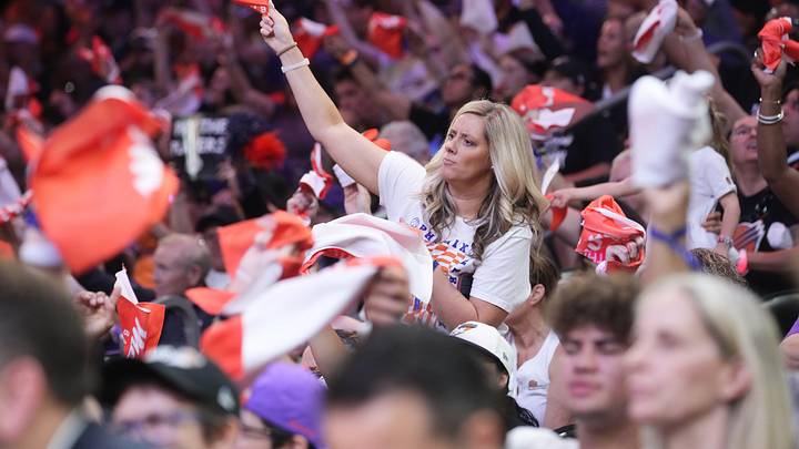 Fans cheer on the Phoenix Mercury as they play the Minnesota Lynx in their WNBA semifinal playoff game at PHX Arena on Sept. 28, 2025.