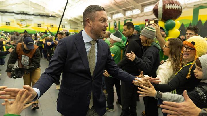 Oregon coach Dan Lanning greets fans at the Moshofsky Sports Center before the College Football Playoff game between Oregon and James Madison Dec. 20, 2025.