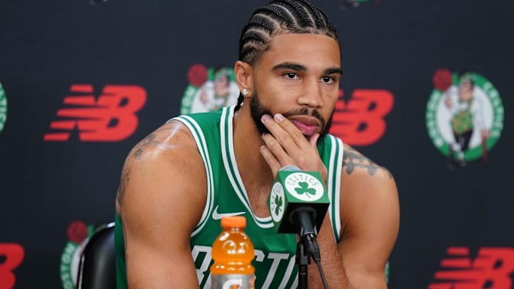 Sep 29, 2025; Boston, MA, USA; Boston Celtics forward Jayson Tatum (0) talks with reporters during media day at the Auerbach Center.