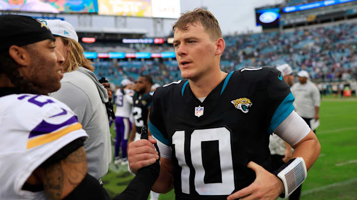 Jacksonville Jaguars quarterback Mac Jones (10) greets Minnesota Vikings cornerback Stephon Gilmore (2) after the game an NFL football matchup Sunday, Nov. 10, 2024 at Everbank Stadium in Jacksonville, Fla. The Vikings defeated the Jaguars 12-7. 