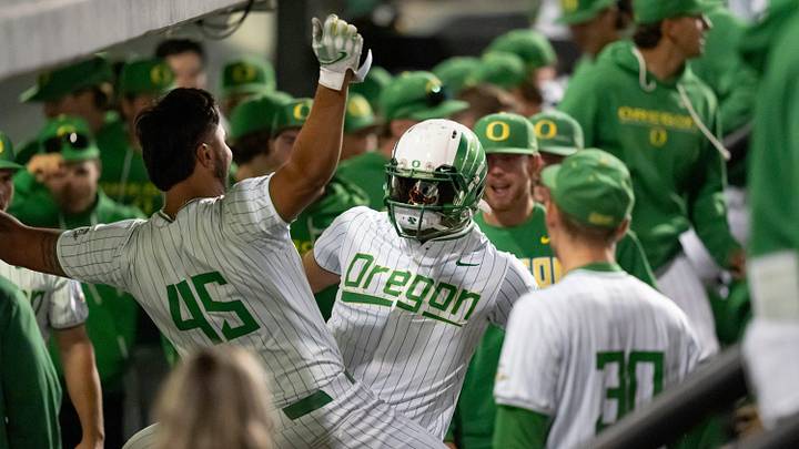 Oregon’s Naulivou Lauaki Jr., center right, celebrates a home run as the Oregon Ducks host the USC Trojans on May 14, 2026, in Eugene, Oregon. Oregon’s Naulivou Lauaki Jr., center right, celebrates a home run as the Oregon Ducks host the USC Trojans on May 14, 2026, in Eugene, Oregon.