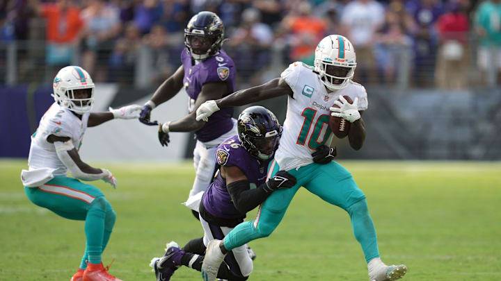 Sep 18, 2022; Baltimore, Maryland, USA; Miami Dolphins wide receiver Tyreek Hill (10) gains yardage