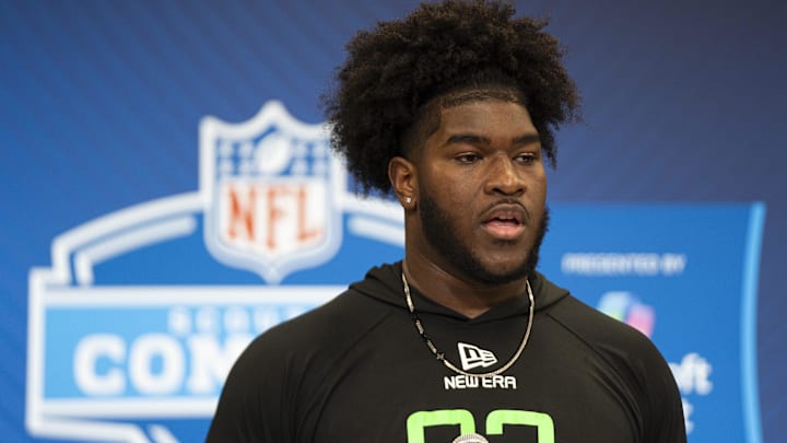 Mar 1, 2025; Indianapolis, IN, USA; University of Alabama offensive lineman Tyler Booker (OL03) answers questions at a press conference during the 2025 NFL Combine at Indiana Convention Center.