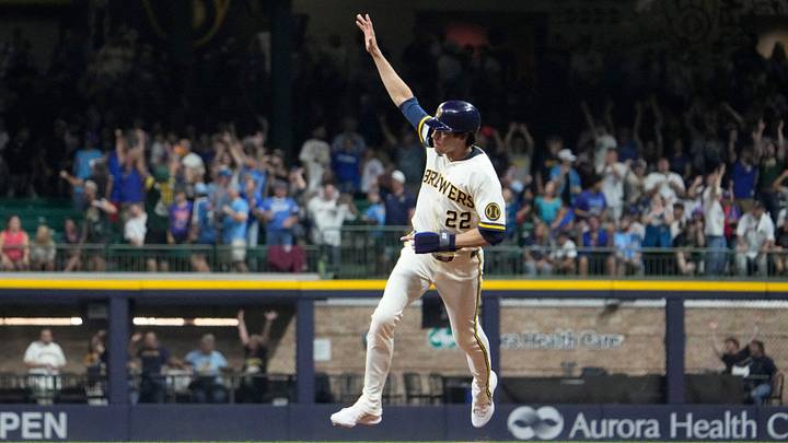 Sep 8, 2026; Milwaukee, Wisconsin, USA;  Milwaukee Brewers designated hitter Christian Yelich (22) celebrates as Milwaukee Brewers left fielder Jackson Chourio (11) (not pictured)  hits a two run home run to tie the game against the Chicago Cubs in the ninth inning at American Family Field.  Mandatory Credit: Michael McLoone-Imagn Images