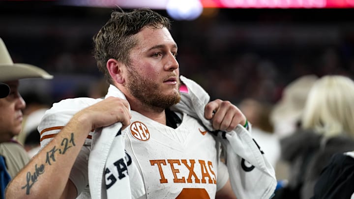 Texas Longhorns quarterback Quinn Ewers (3) looks into the crowd after the 28-14 loss to Ohio State in the College Football Playoff semifinal game in the Cotton Bowl at AT&T Stadium on Friday, Jan. 10, 2024 in Arlington, Texas.