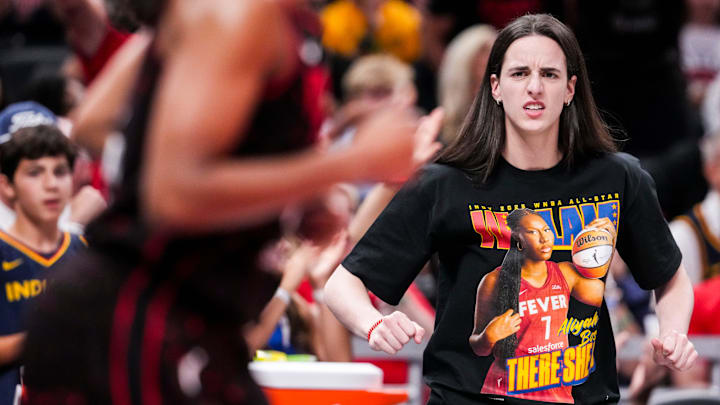Indiana Fever guard Caitlin Clark (22) celebrates Indiana Fever guard Kelsey Mitchell (0) on Saturday, Aug. 9, 2025, during a game between the Indiana Fever and the Chicago Sky at Gainbridge Fieldhouse in Indianapolis.
