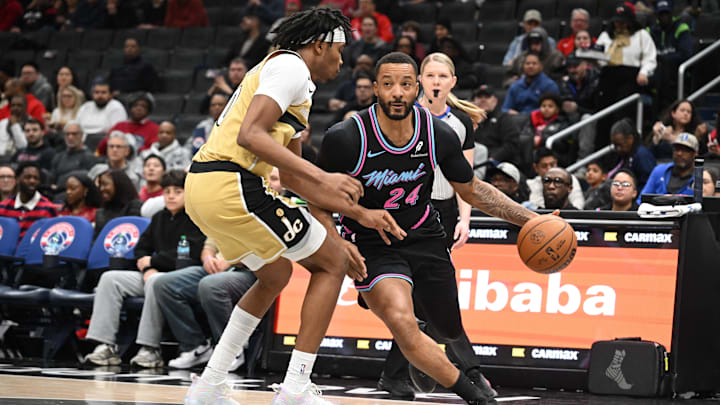 Feb 8, 2026; Washington, District of Columbia, USA; Miami Heat guard Norman Powell (24) attempts to drive past Washington Wizards guard Bilal Coulibaly (0) during the first quarter at Capital One Arena. Mandatory Credit: Rafael Suanes-Imagn Images Feb 8, 2026; Washington, District of Columbia, USA; Miami Heat guard Norman Powell (24) attempts to drive past Washington Wizards guard Bilal Coulibaly (0) during the first quarter at Capital One Arena. Mandatory Credit: Rafael Suanes-Imagn Images