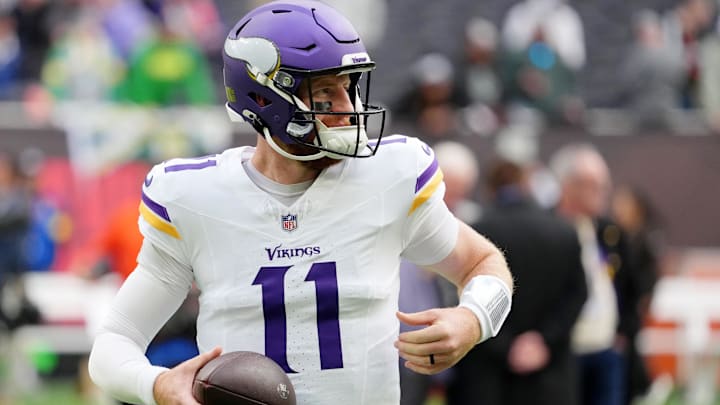 Oct 5, 2025; Tottenham, United Kingdom; Minnesota Vikings quarterback Carson Wentz (11) warms up before an NFL International Series game between the Minnesota Vikings and the Cleveland Browns at Tottenham Hotspur Stadium.