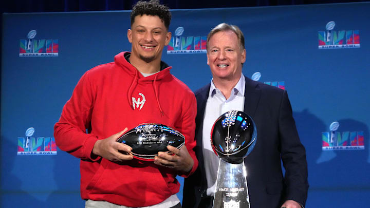 Feb 13, 2023; Phoenix, AZ, USA; Kansas City Chiefs quarterback Patrick Mahomes (left) and NFL commissioner Roger Goodell pose with Vince Lombardi and most valuable player trophies during the Super Bowl 57 Winning Team Head Coach and MVP press conference at the Phoenix Convention Center. Mandatory Credit: Kirby Lee-Imagn Images