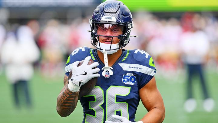 Seattle Seahawks running back George Holani warms up before the game against the San Francisco 49ers. Seattle Seahawks running back George Holani warms up before the game against the San Francisco 49ers.