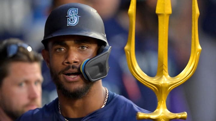 Seattle Mariners center fielder Julio Rodriguez celebrates in the dugout after a home run against the Los Angeles Angels on July 24 at Angel Stadium. Seattle Mariners center fielder Julio Rodriguez celebrates in the dugout after a home run against the Los Angeles Angels on July 24 at Angel Stadium.