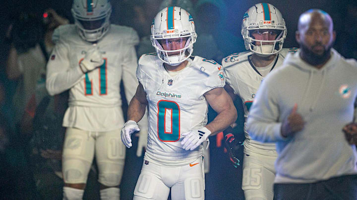 Miami Dolphins receiver Braxton Berrios, leads his teammates entering the field just before the start of their game agains the Buffalo Bills NFL football game Jan 07, 2024, in Miami Gardens. Miami Dolphins receiver Braxton Berrios, leads his teammates entering the field just before the start of their game agains the Buffalo Bills NFL football game Jan 07, 2024, in Miami Gardens.