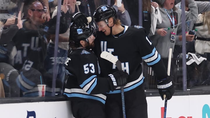 Jan 29, 2025; Salt Lake City, Utah, USA; Utah Hockey Club left wing Michael Carcone (53) celebrates scoring a goal against the Pittsburgh Penguins with center Nick Bjugstad (17) during the second period at Delta Center. Mandatory Credit: Rob Gray-Imagn Images