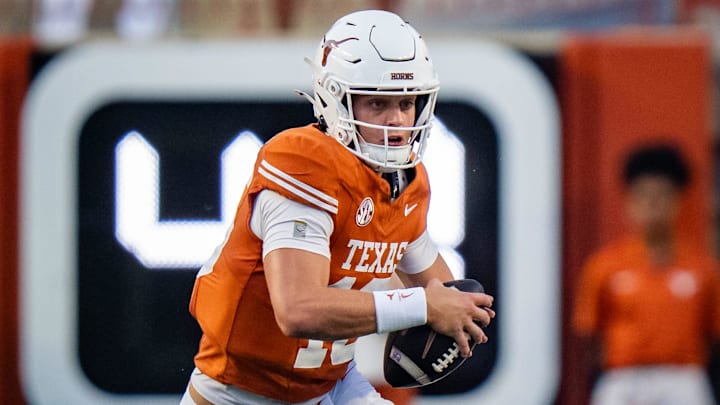 Texas Longhorns quarterback Arch Manning (16) runs the ball in the first half of the Texas Longhorns' game against the ULM Warhawks at Darrell K Royal Texas Memorial Stadium in Austin, Sept. 21, 2024.