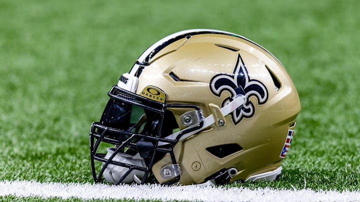 Jan 7, 2024; New Orleans, Louisiana, USA; Detailed view of the New Orleans Saints helmet during warmups against the Atlanta Falcons at Caesars Superdome. Mandatory Credit: Stephen Lew-Imagn Images Jan 7, 2024; New Orleans, Louisiana, USA; Detailed view of the New Orleans Saints helmet during warmups against the Atlanta Falcons at Caesars Superdome. Mandatory Credit: Stephen Lew-Imagn Images