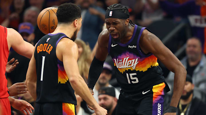 Apr 7, 2026; Phoenix, Arizona, USA; Phoenix Suns center Mark Williams (15) celebrates with Devin Booker (1) against the Houston Rockets in the first half at Mortgage Matchup Center. Mandatory Credit: Mark J. Rebilas-Imagn Images
