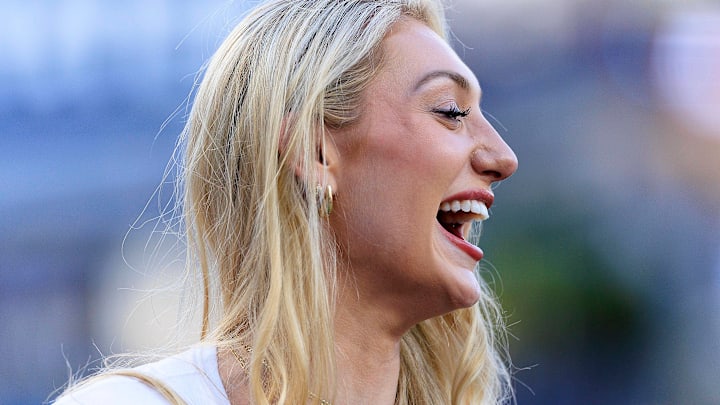 Cameron Brink of the Los Angeles Sparks react after throwing the honorary first pitch at the Los Angeles Dodgers game. Cameron Brink of the Los Angeles Sparks react after throwing the honorary first pitch at the Los Angeles Dodgers game.