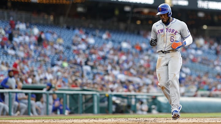 Jun 3, 2024; Washington, District of Columbia, USA; New York Mets outfielder Starling Marte (6) scores a run on a sacrifice fly by Mets outfielder Harrison Bader (not pictured) against the Washington Nationals during the second inning at Nationals Park.