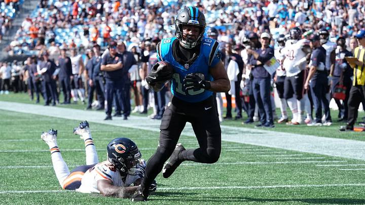 Carolina Panthers wide receiver Jalen Coker (18) runs with the ball while defended by Chicago Bears defensive back Tyrique Stevenson (29) in the second half at Bank of America Stadium. Mandatory Credit: Jim Dedmon-Imagn Images Carolina Panthers wide receiver Jalen Coker (18) runs with the ball while defended by Chicago Bears defensive back Tyrique Stevenson (29) in the second half at Bank of America Stadium. Mandatory Credit: Jim Dedmon-Imagn Images