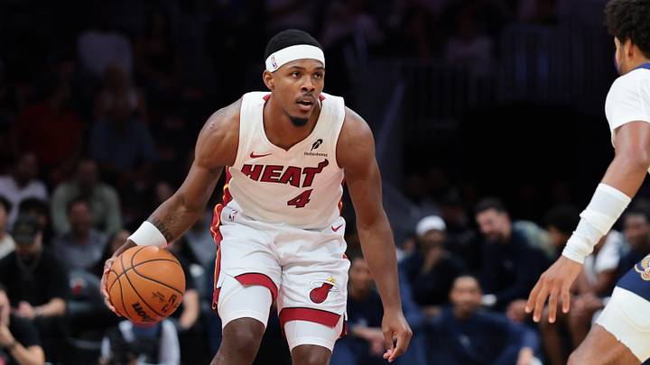 Oct 8, 2026; Miami, Florida, USA; Miami Heat guard Ryan Conwell (4) drives to the basket against New Orleans Pelicans guard Jordan Poole (3) during the first quarter at Kaseya Center. Mandatory Credit: Sam Navarro-Imagn Images