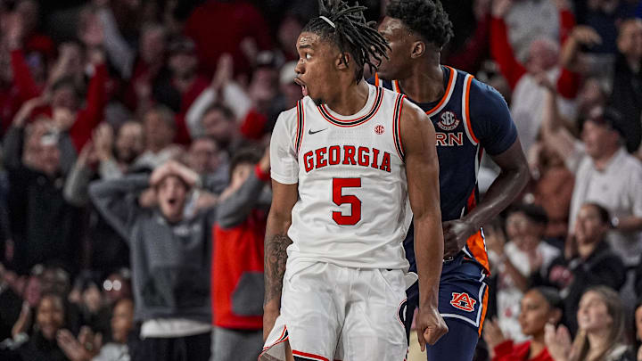 Jan 3, 2026; Athens, Georgia, USA; Georgia Bulldogs guard Jeremiah Wilkinson (5) reacts after making a three point shot against the Auburn Tigers during overtime at Stegeman Coliseum. Mandatory Credit: Dale Zanine-Imagn Images Jan 3, 2026; Athens, Georgia, USA; Georgia Bulldogs guard Jeremiah Wilkinson (5) reacts after making a three point shot against the Auburn Tigers during overtime at Stegeman Coliseum. Mandatory Credit: Dale Zanine-Imagn Images