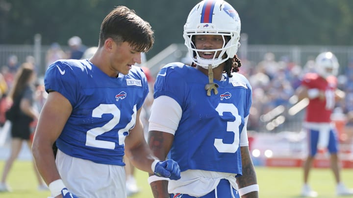 Bills defensive back Cole Bishop talks with Damar Hamlin between drills during day six of Buffalo Bills training camp.