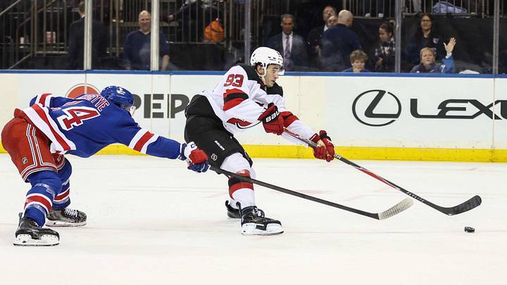 Sep 24, 2026; New York, New York, USA; New Jersey Devils forward Amadeus Lombardi (93) skates past New York Rangers left wing Tye Kartye (24) for a shot on goal attempt in the third period at Madison Square Garden. Mandatory Credit: Wendell Cruz-Imagn Images Sep 24, 2026; New York, New York, USA; New Jersey Devils forward Amadeus Lombardi (93) skates past New York Rangers left wing Tye Kartye (24) for a shot on goal attempt in the third period at Madison Square Garden. Mandatory Credit: Wendell Cruz-Imagn Images