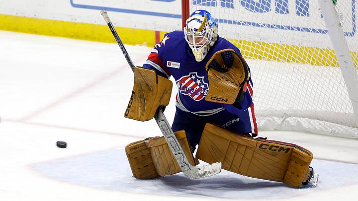 Rochester goalie Devon Levi makes the save on this shot against Laval . Rochester goalie Devon Levi makes the save on this shot against Laval .