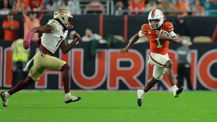 Oct 17, 2026; Miami Gardens, Florida, USA; Miami Hurricanes wide receiver Malachi Toney (1) runs against Florida State Seminoles defensive back Ashlynd Barker (7) during the third quarter at Hard Rock Stadium. Mandatory Credit: Sam Navarro-Imagn Images Oct 17, 2026; Miami Gardens, Florida, USA; Miami Hurricanes wide receiver Malachi Toney (1) runs against Florida State Seminoles defensive back Ashlynd Barker (7) during the third quarter at Hard Rock Stadium. Mandatory Credit: Sam Navarro-Imagn Images