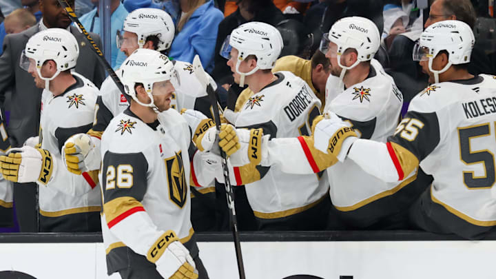 Apr 24, 2026; Salt Lake City, Utah, USA; Vegas Golden Knights center Nic Dowd (26) celebrates with teammates after scoring a goal against the Utah Mammoth during the third period in game three of the first round of the 2026 Stanley Cup Playoffs at Delta Center. Mandatory Credit: Rob Gray-Imagn Images