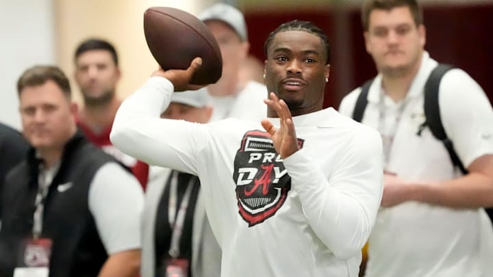 Mar 19, 2025; Tuscaloosa AL, USA; Quarterback Jalen Milroe throws for scouts at the University of Alabama Pro Day as several Crimson Tide players worked out for NFL teams in the Hank Crisp Indoor Practice Facility.