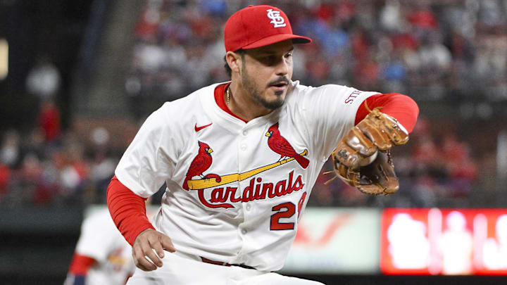 May 6, 2025; St. Louis, Missouri, USA; St. Louis Cardinals third baseman Nolan Arenado (28) fields a ground ball against the Pittsburgh Pirates during the sixth inning at Busch Stadium