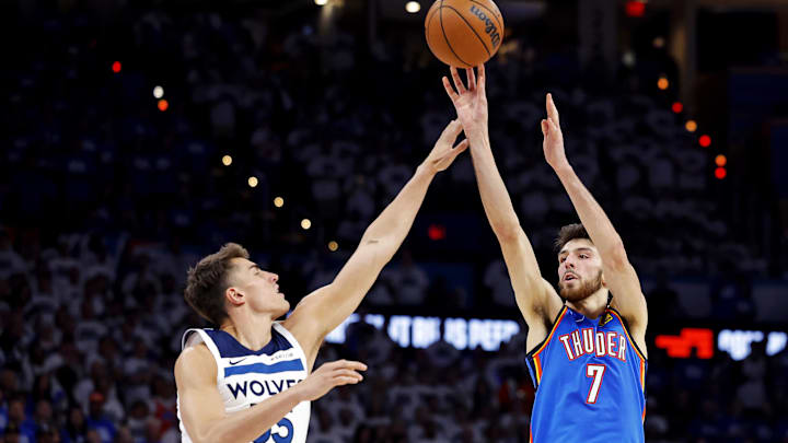 May 28, 2025; Oklahoma City, Oklahoma, USA; Oklahoma City Thunder forward Chet Holmgren (7) shoots the ball against Minnesota Timberwolves center Luka Garza (55) during the fourth quarter in game five of the western conference finals for the 2025 NBA Playoffs at Paycom Center. Mandatory Credit: Alonzo Adams-Imagn Images