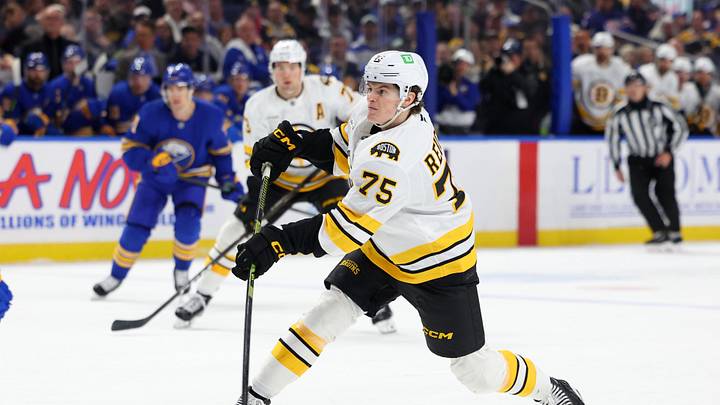 Mar 25, 2026; Buffalo, New York, USA; Boston Bruins left wing Lukas Reichel (75) takes a shot on goal during the first period against the Buffalo Sabres at KeyBank Center. Mandatory Credit: Timothy T. Ludwig-Imagn Images Mar 25, 2026; Buffalo, New York, USA; Boston Bruins left wing Lukas Reichel (75) takes a shot on goal during the first period against the Buffalo Sabres at KeyBank Center. Mandatory Credit: Timothy T. Ludwig-Imagn Images