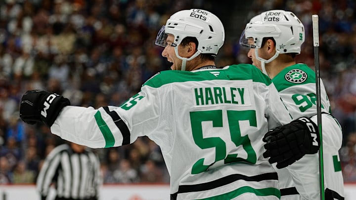 Oct 11, 2025; Denver, Colorado, USA; Dallas Stars defenseman Thomas Harley (55) celebrates his goal with right wing Mikko Rantanen (96) in the first period against the Colorado Avalanche at Ball Arena. Mandatory Credit: Isaiah J. Downing-Imagn Images