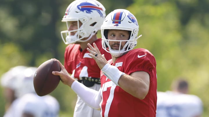 Buffalo Bills quarterback Josh Allen looks to pass the football during joint training camp practice with the Chicago Bears.