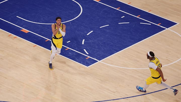 May 21, 2025; New York, New York, USA; Indiana Pacers guard Tyrese Haliburton (0) reacts after tying the game in the fourth quarter to send the game to overtime against the New York Knicks during game one of the eastern conference finals for the 2025 NBA Playoffs at Madison Square Garden. Mandatory Credit: Brad Penner-Imagn Images