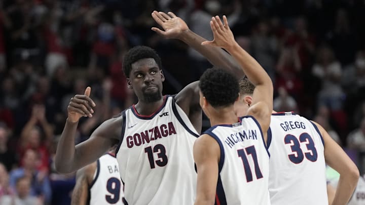 Gonzaga Bulldogs forward Graham Ike (13) celebrates with guard Nolan Hickman (11). 