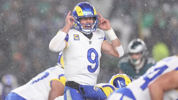 Jan 19, 2025; Philadelphia, Pennsylvania, USA; Los Angeles Rams quarterback Matthew Stafford (9) calls a play from the line of scrimmage in the third quarter against the Philadelphia Eagles in a 2025 NFC divisional round game at Lincoln Financial Field. Mandatory Credit: Bill Streicher-Imagn Images