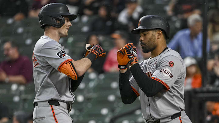 Sep 17, 2024; Baltimore, Maryland, USA; aSan Francisco Giants outfielder Mike Yastrzemski (5 celebrates with first base LaMonte Wade Jr. (31) after hitting a first inning solo home run against the Baltimore Orioles at Oriole Park at Camden Yards. Sep 17, 2024; Baltimore, Maryland, USA; aSan Francisco Giants outfielder Mike Yastrzemski (5 celebrates with first base LaMonte Wade Jr. (31) after hitting a first inning solo home run against the Baltimore Orioles at Oriole Park at Camden Yards.