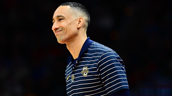 Mar 21, 2025; Cleveland, OH, USA; Marquette Golden Eagles head coach Shaka Smart reacts in the first half against the New Mexico Lobos during the NCAA Tournament First Round at Rocket Arena. Mandatory Credit: Ken Blaze-Imagn Images Mar 21, 2025; Cleveland, OH, USA; Marquette Golden Eagles head coach Shaka Smart reacts in the first half against the New Mexico Lobos during the NCAA Tournament First Round at Rocket Arena. Mandatory Credit: Ken Blaze-Imagn Images
